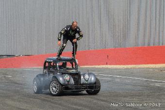 Shouldn't he be IN the car.....  The amazing Terry Grant